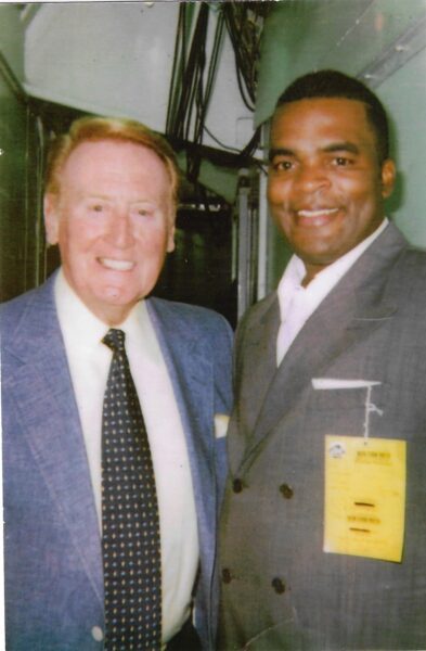 Reginald Armstrong and Vince Scully