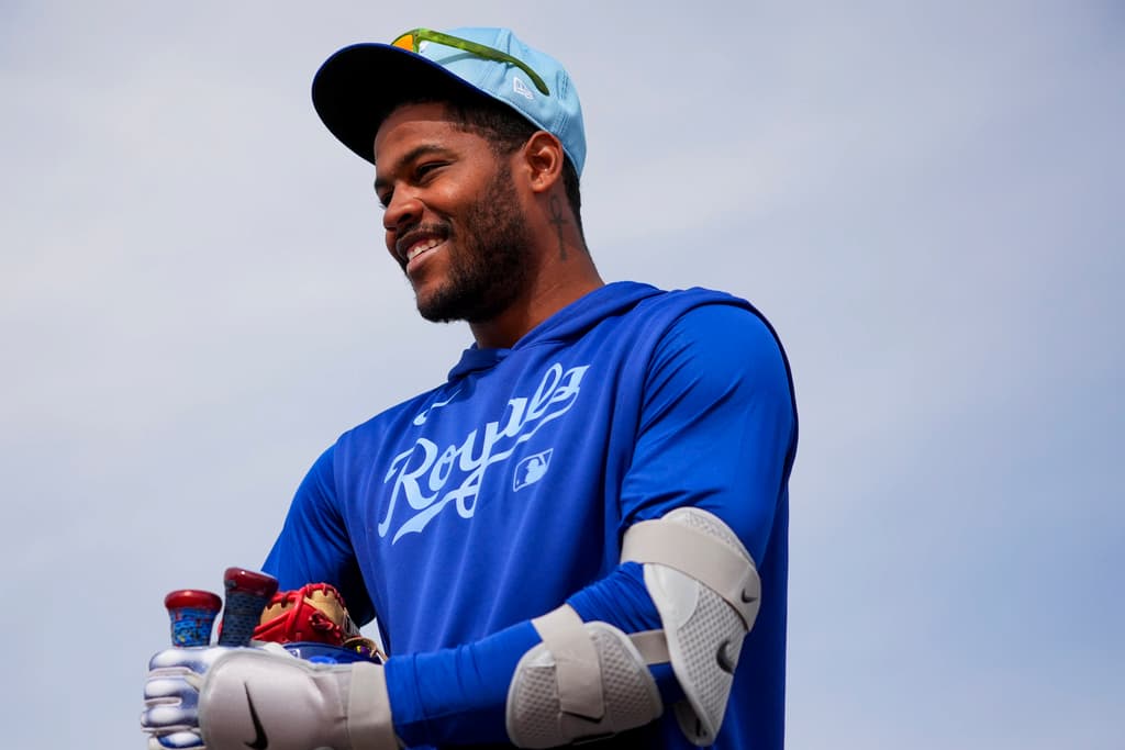 Title: Royals Spring BaseballImage ID: 25047785498659 Article: Kansas City Royals infielder Maikel Garcia smiles during spring training baseball practice at the team's training facility Sunday, Feb. 16, 2025, in Surprise, Ariz. (AP Photo/Lindsey Wasson) 