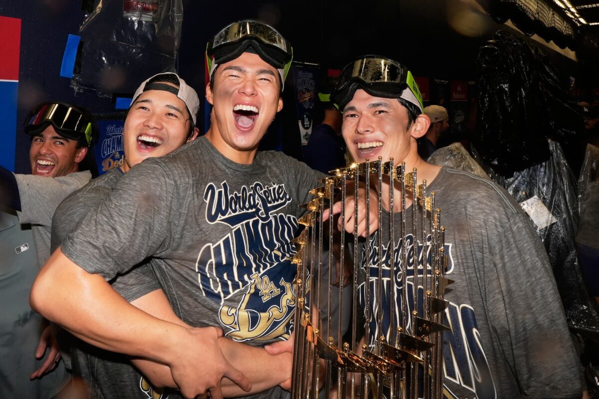 Title: APTOPIX World Series Dodgers Blue Jays Baseball Image ID: 25306195689537 Article: Los Angeles Dodgers pitcher Shohei Ohtani, pitcher Yoshinobu Yamamoto and pitcher Roki Sasaki celebrate after their win against the Toronto Blue Jays in Game 7 of baseball's World Series, Sunday, Nov. 2, 2025, in Toronto. (AP Photo/Brynn Anderson)