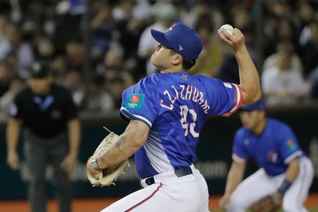 2025 World Baseball Classic Qualifier, illustrating the Athletics selecting the contract of Taiwanese right hander Chen Zhong Ao Zhuang. Taiwan pitcher Chen Zhong Ao Zhuang (48) throws during the first inning of a World Baseball Classic qualifying game against Spain in Taipei, Taiwan, Tuesday, Feb. 25, 2025. (AP Photo/Chiang Ying-ying)