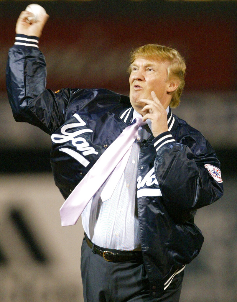 TRUMP - World Baseball Network Title: ASTROS YANKEES SPRING Image ID: 04031203881 Article: Businessman Donald Trump throws out the first pitch before the New York Yankees faced the Houston Astros, Friday, March 12, 2004, at Legends Field in Tampa, Fla. (AP Photo/Kathy Willens)