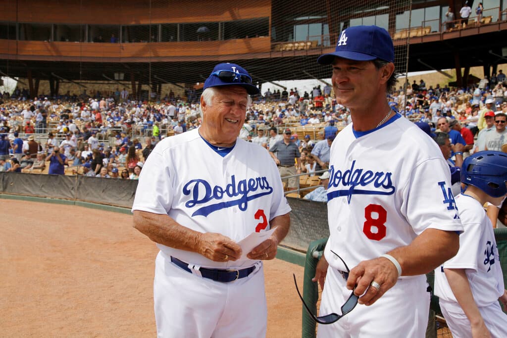 Title: Brewers Dodgers Spring Baseball Image ID: 11031909861 Article: Los Angeles Dodgers' Tommy Lasorda, left, and manager Don Mattingly smile as they talk to each others before the Dodgers' spring training baseball game against the Milwaukee Brewers on Saturday, March 19, 2011, in Glendale, Ariz. (AP Photo/Nam Y. Huh) - World Baseball Network Title: Brewers Dodgers Spring Baseball Image ID: 11031909861 Article: Los Angeles Dodgers' Tommy Lasorda, left, and manager Don Mattingly smile as they talk to each others before the Dodgers' spring training baseball game against the Milwaukee Brewers on Saturday, March 19, 2011, in Glendale, Ariz. (AP Photo/Nam Y. Huh)