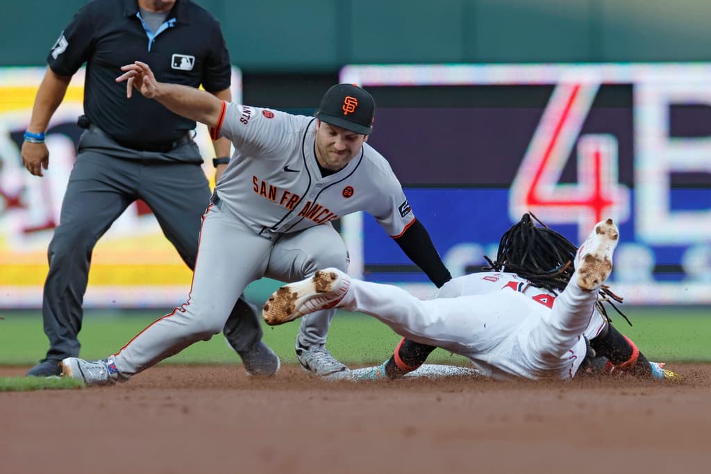Title: Giants Reds Baseball Image ID: 24217008270461 Article: San Fransisco Giants second baseman Casey Schmidt, front left, tags Cincinnati Reds' Elly De La Cruz, right, who was trying to steal second during the first inning of a baseball game Saturday, Aug. 3, 2024, in Cincinnati. (AP Photo/Jay LaPrete)