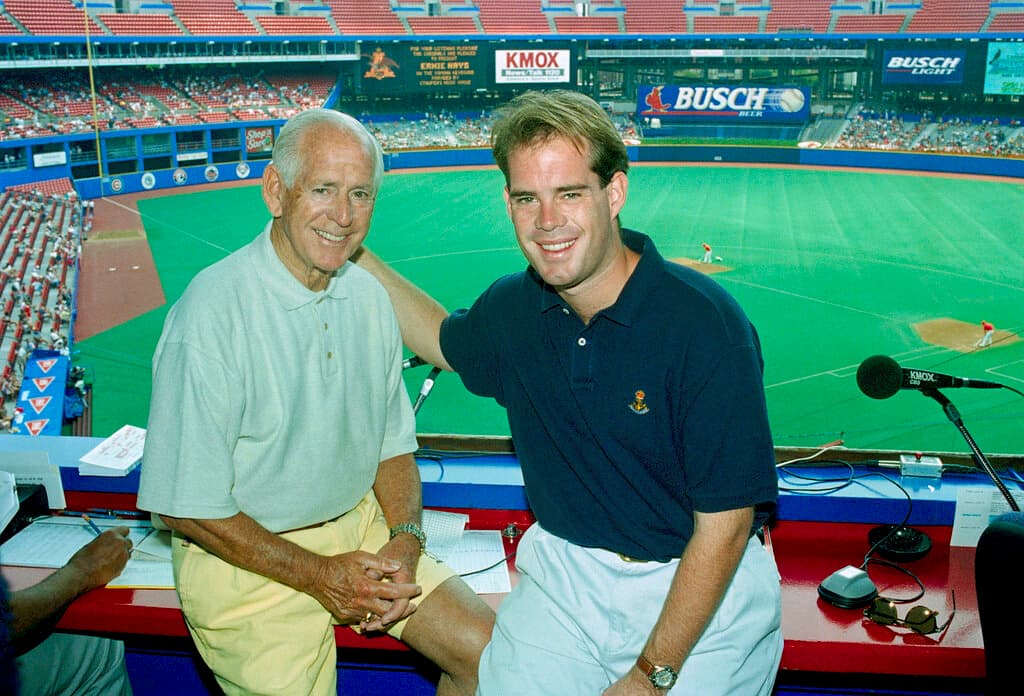 Title: Jack And Joe BuckImage ID: 9506180356 Article: St. Louis Cardinals Hall of Fame Broadcaster Jack Buck, left, and his son Joe Buck celebrate Father's Day as they go into their fifth season of broadcasting St. Louis Cardinals Baseball together in St. Louis, June 18, 1995. (AP Photo/Leon Algee)