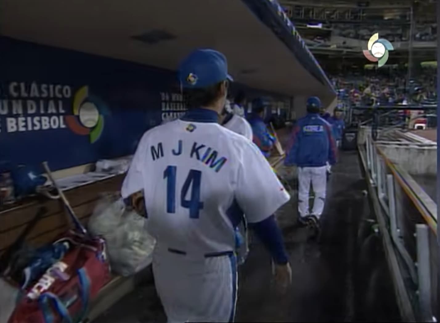 Kim Min-jae walks through the dugout wearing South Korea’s colors during the 2006 World Baseball Classic, representing his country on the global stage at the inaugural WBC.