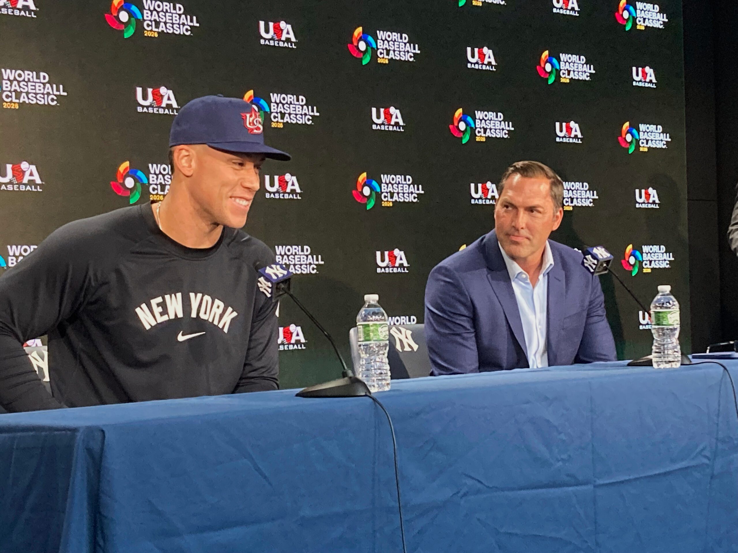 U.S. captain Aaron Judge and U.S. manager Mark DeRosa attend a news conference Monday, April 14, 2025, at Yankee Stadium, in New York. (AP Photo/Ron Blum)