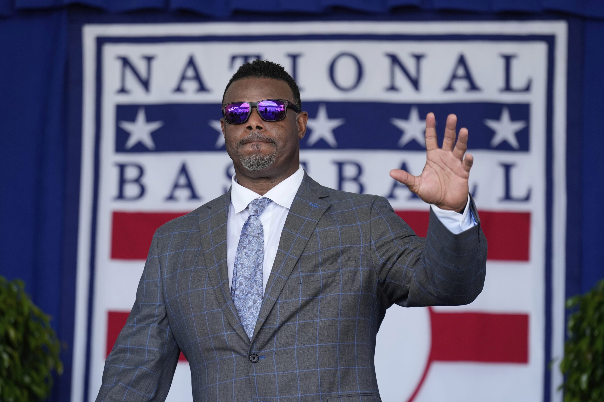Hall of Famer Ken Griffey Jr. arrives on stage for the National Baseball Hall of Fame induction ceremony in Cooperstown, N.Y., Sunday, July 27, 2025. (AP Photo/Seth Wenig)