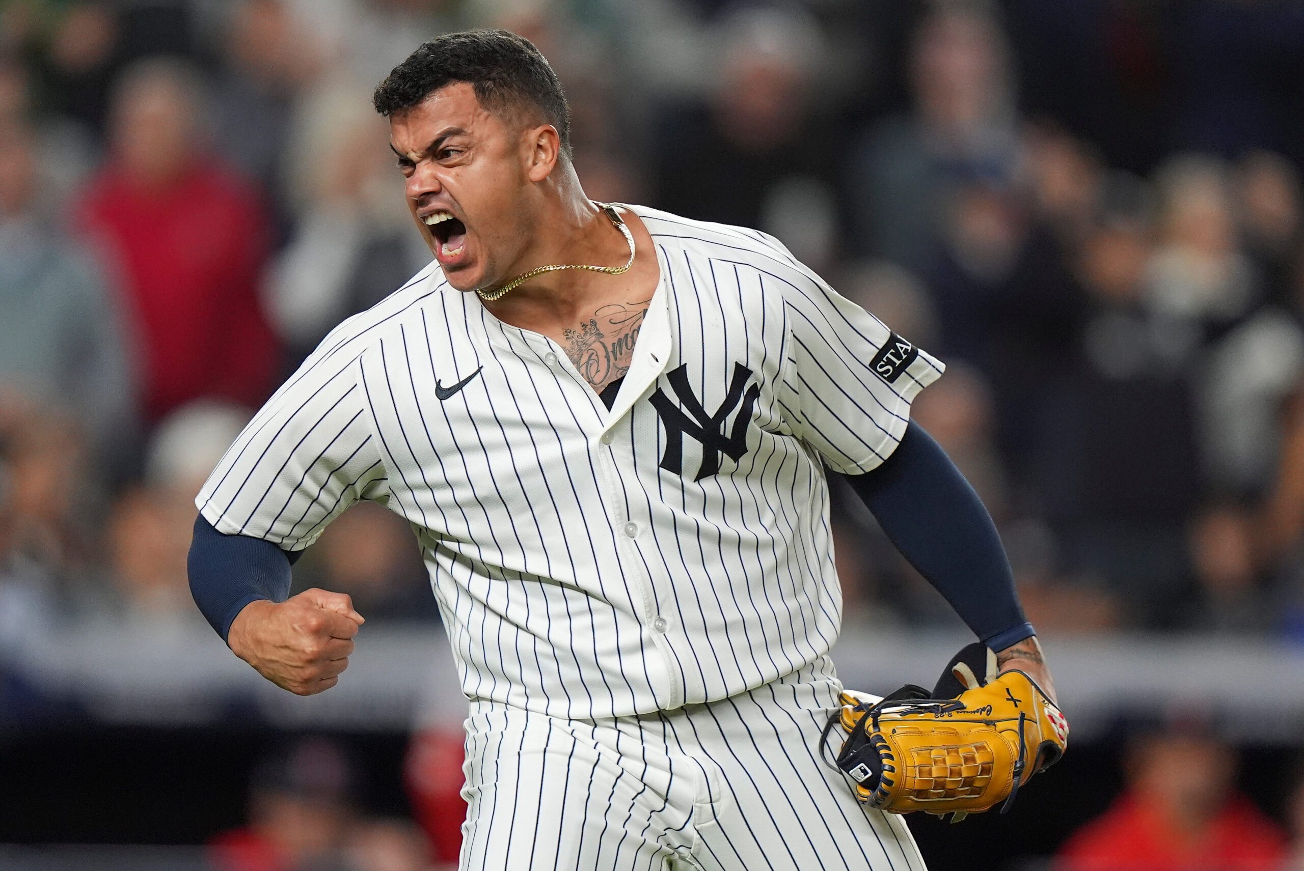 New York Yankees pitcher Fernando Cruz reacts after Boston Red Sox Trevor Story flied out to end the top of the seventh inning of Game 2 of an American League wild-card baseball playoff series, Wednesday, Oct. 1, 2025, in New York. (AP Photo/Frank Franklin II)