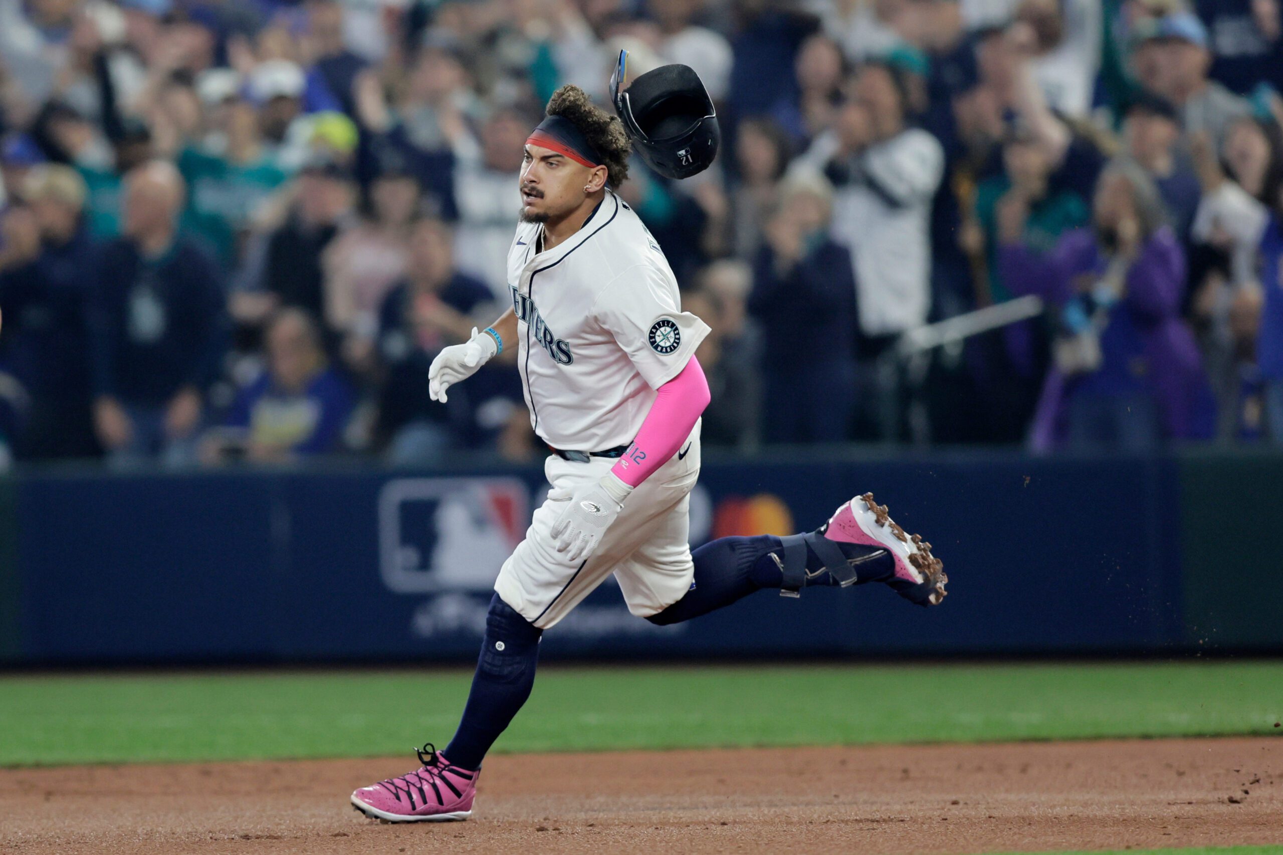 Seattle Mariners' Josh Naylor runs to second on a double against the Detroit Tigers during the second inning in Game 5 of baseball's American League Division Series, Friday, Oct. 10, 2025, in Seattle. (AP Photo/John Froschauer, File)