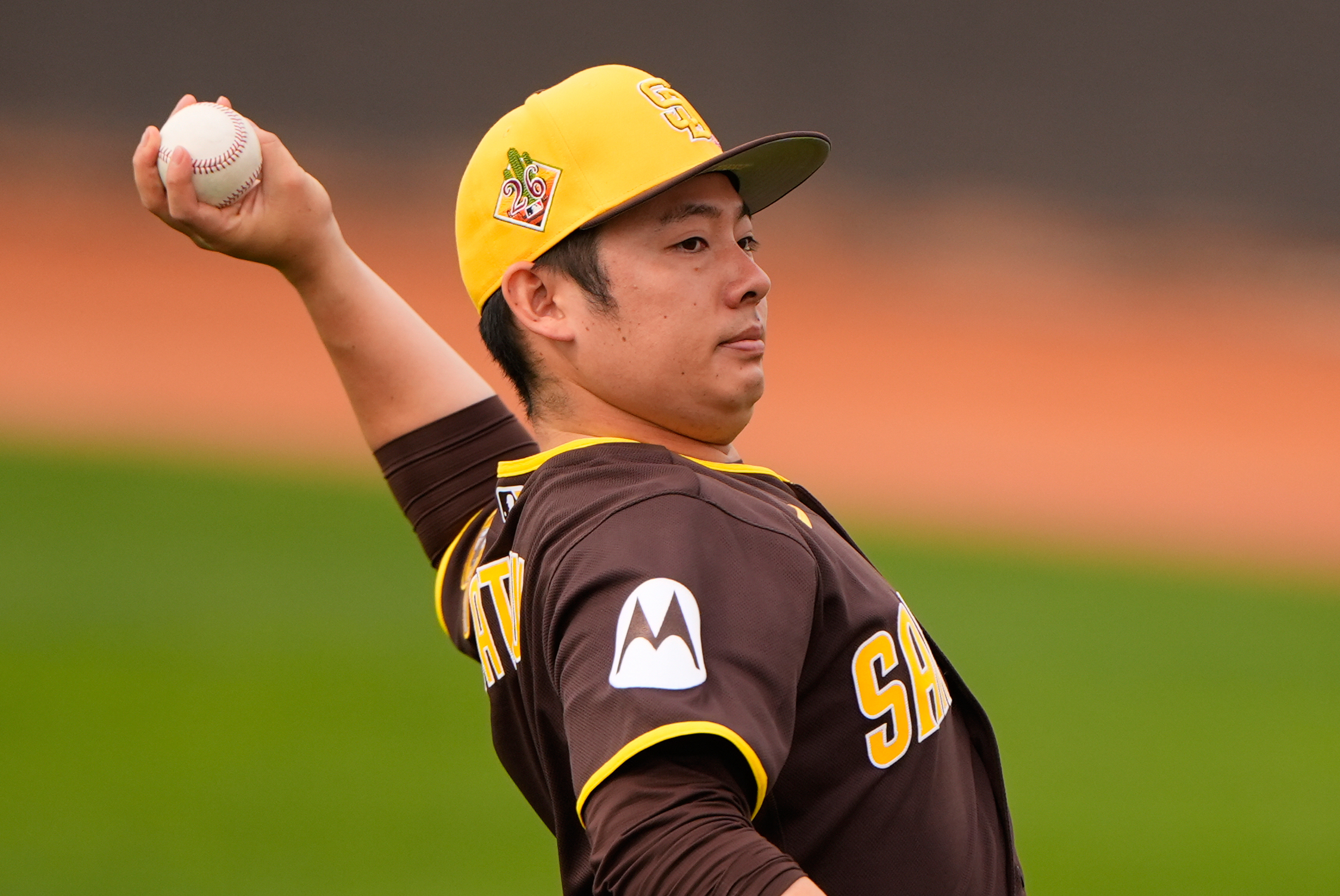 San Diego Padres pitcher Yuki Matsui throws during spring training baseball practice Monday, Feb. 16, 2026, in Peoria, Ariz. (AP Photo/Charlie Riedel)