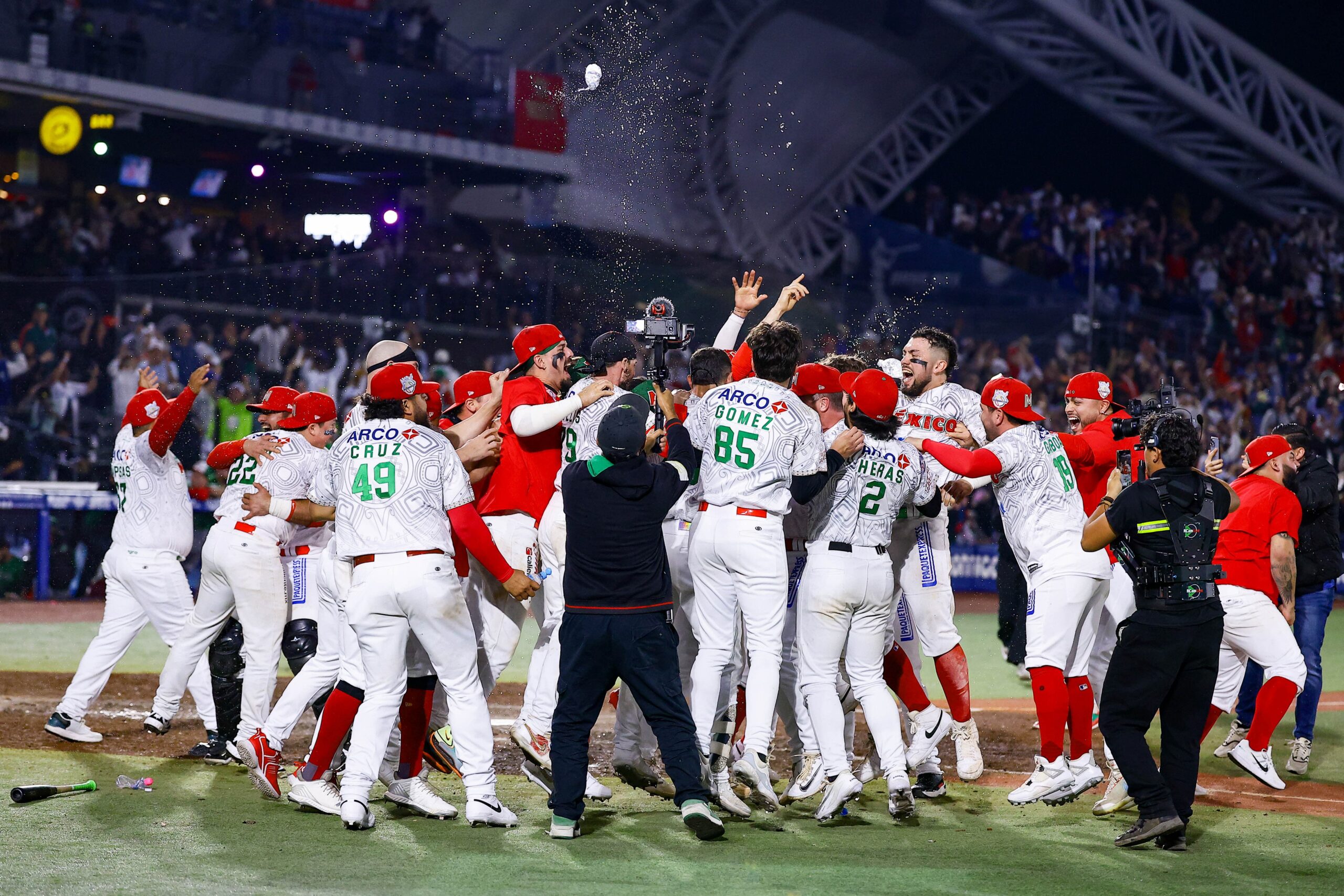 Charros de Jalisco players celebrate on the field after winning the 2026 Caribbean Series championship at Estadio Panamericano in Zapopan.