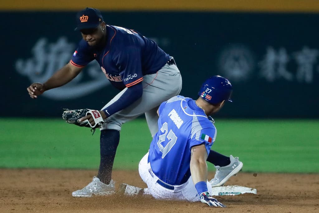 Italy’s Vito Friscia slides into second base during a Pool A game against the Netherlands at the 2023 World Baseball Classic in Taichung, Taiwan. (AP Photo/I-Hwa Cheng)