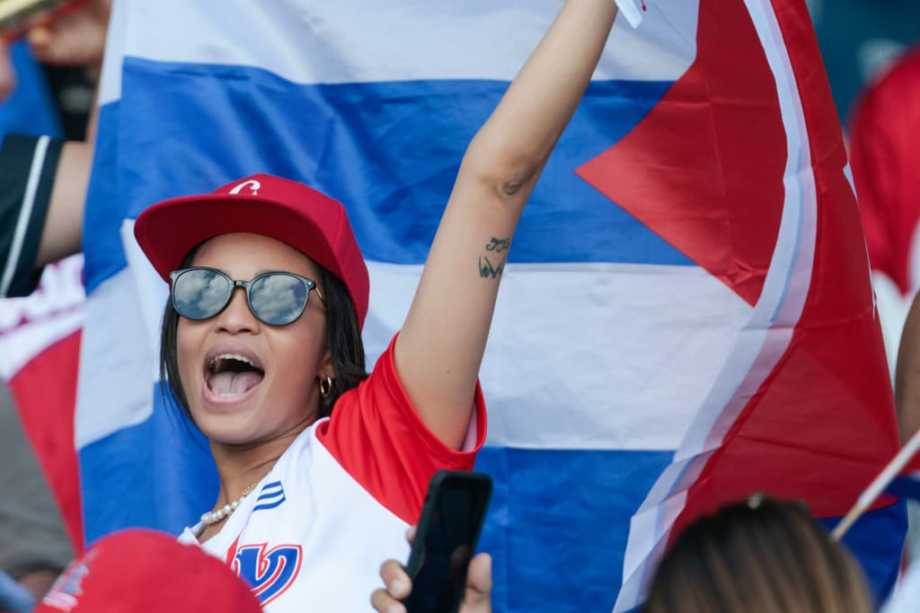 Cuba fans cheer during a World Baseball Classic game between Cuba and Colombia at Hiram Bithorn Stadium in San Juan on March 8, 2026.