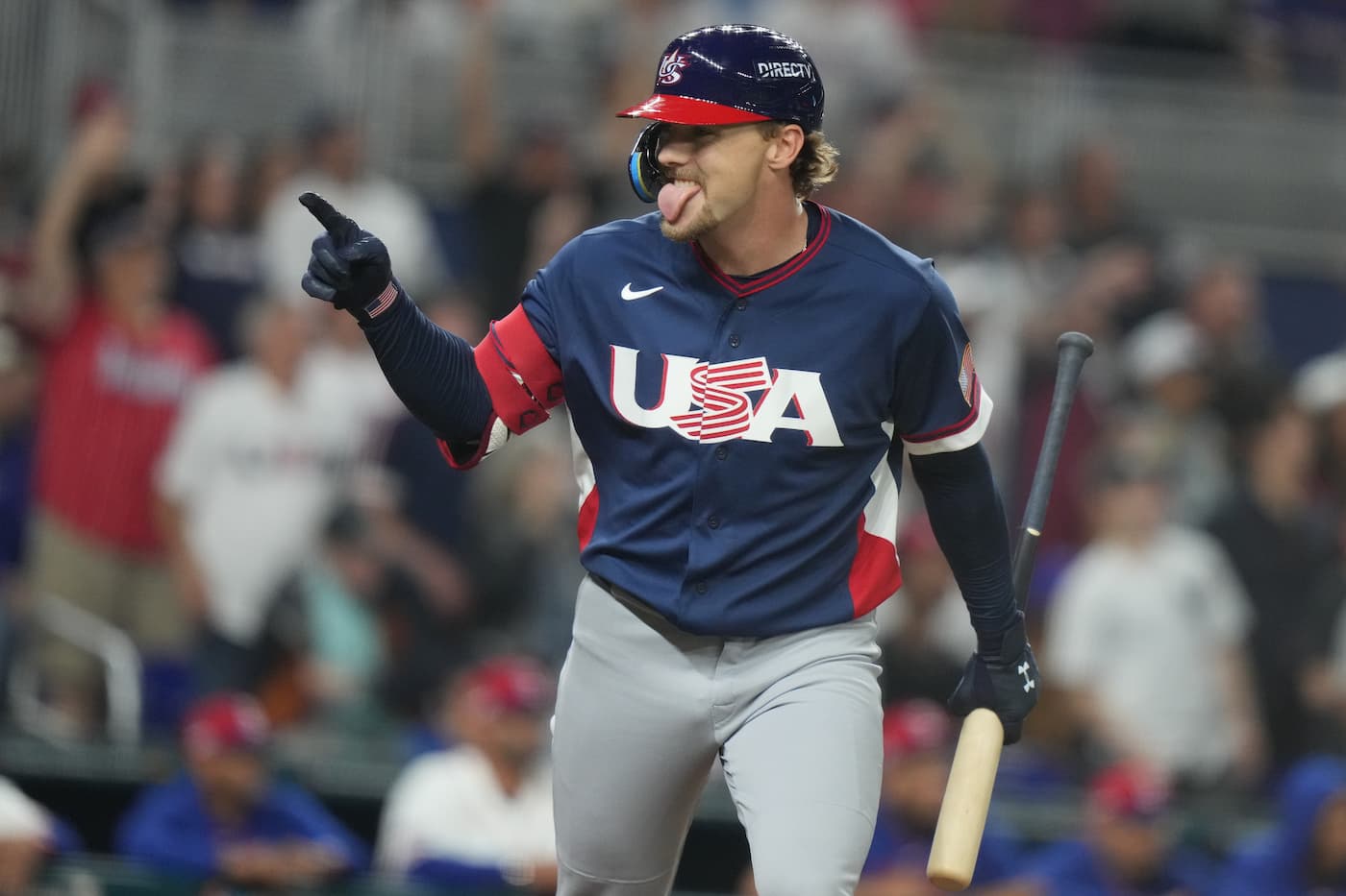 Team USA infielder Gunnar Henderson celebrates toward the dugout after hitting a game-tying home run during the fourth inning of the World Baseball Classic semifinal against the Dominican Republic in Miami.