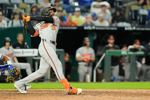Leody Taveras hits first career grand slam and Orioles hold on for wild 7-5 win over Royals in 12