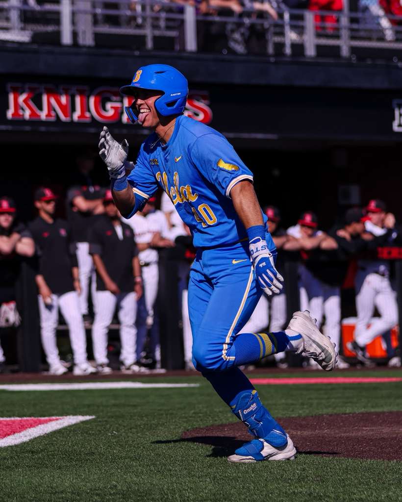 UCLA pitcher Ian May running bases during game vs Rutgers