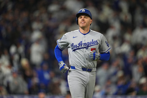 Dodgers place 1B Freeman on paternity list, recall Ward from Triple-A