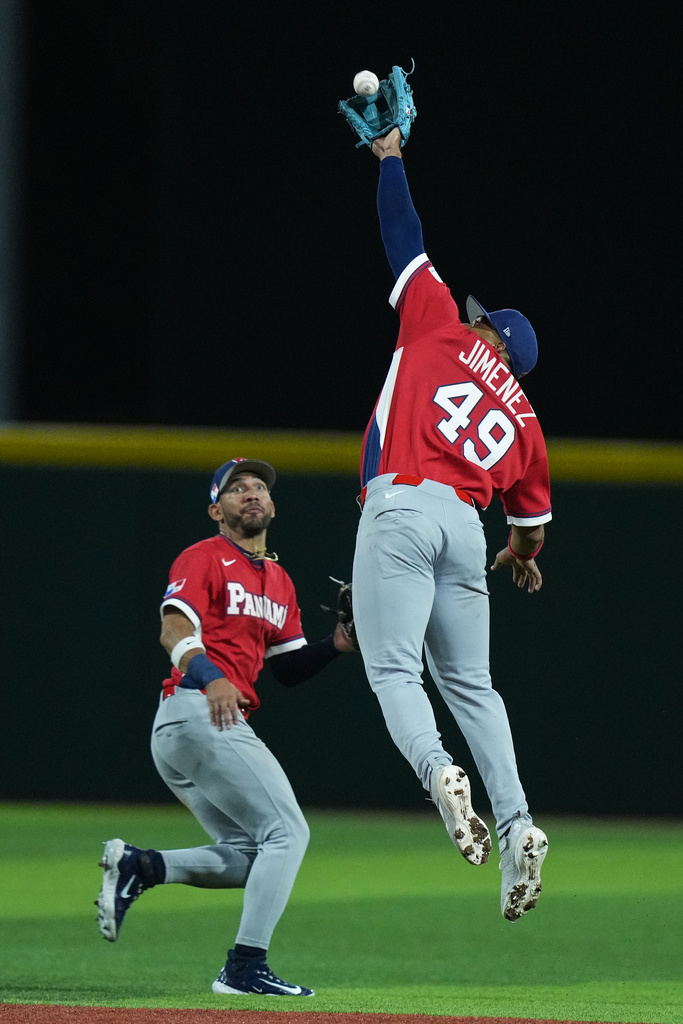 Panama's Leo Jimenez catches a fly ball against Canada at the 2026 World Baseball Classic in San Juan, Puerto Rico