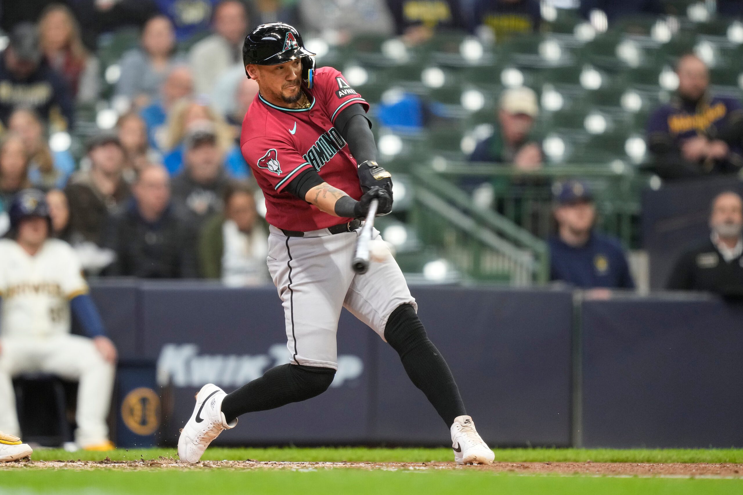 Arizona Diamondbacks' Ildemaro Vargas hits a single during the fourth inning of a baseball game against the Milwaukee Brewers, Thursday, April 30, 2026, in Milwaukee. (AP Photo/Kayla Wolf)