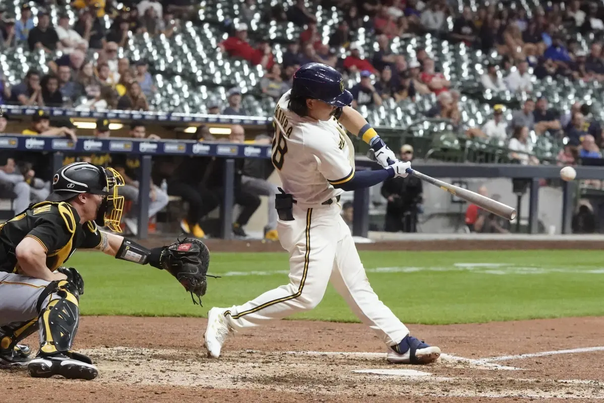 Milwaukee Brewers’ Keston Hiura hits a walk-off two run home run during the ninth inning of a baseball game against the Pittsburgh Pirates Monday, August 29, 2022. (AP Photo/Morry Gash)